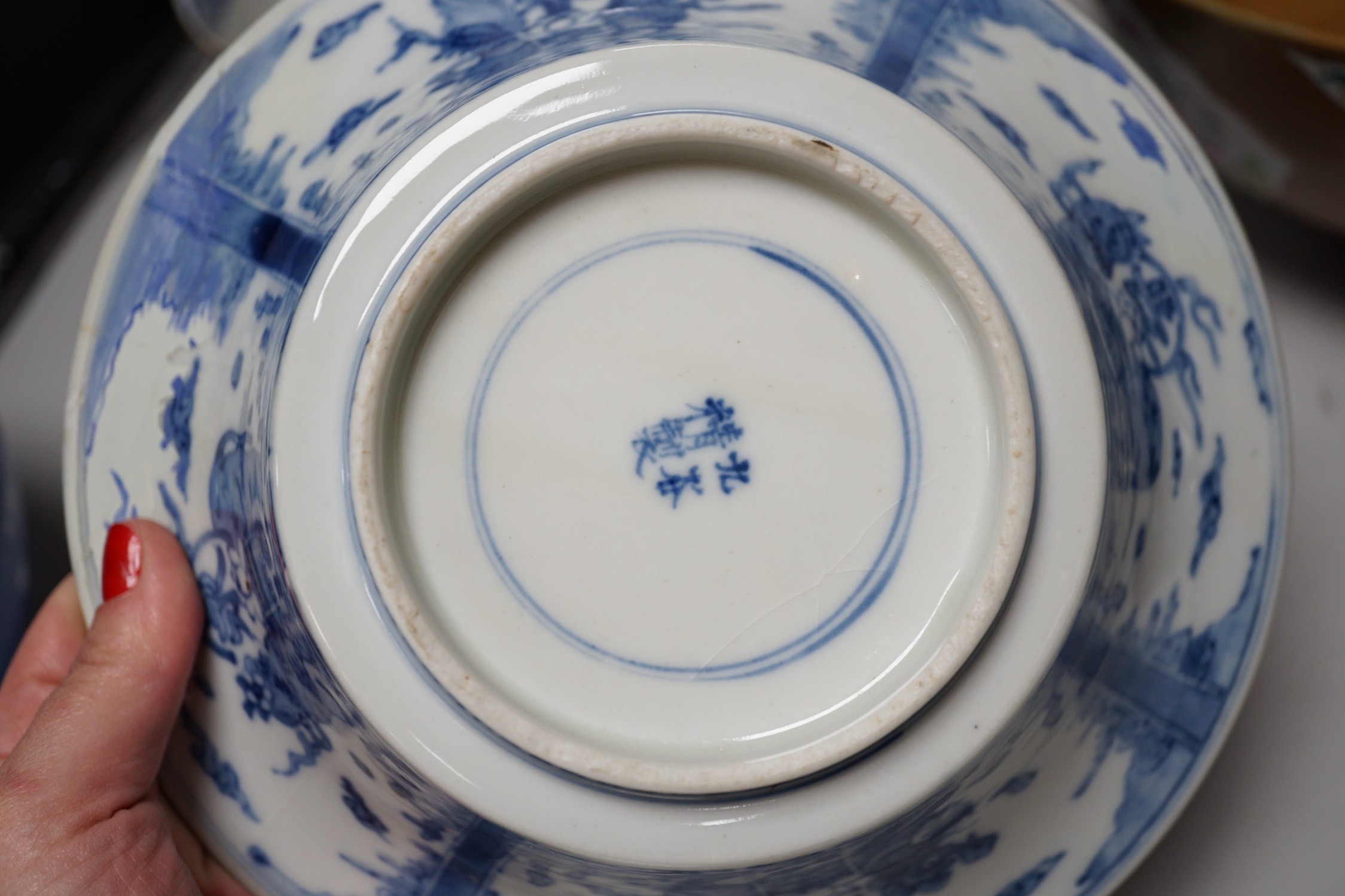 A group of Japanese and Chinese ceramics to include two blue and white jars, a wucai bowl etc.